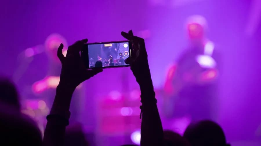 Recording Live Events May Cost You Invitations, Study Finds
