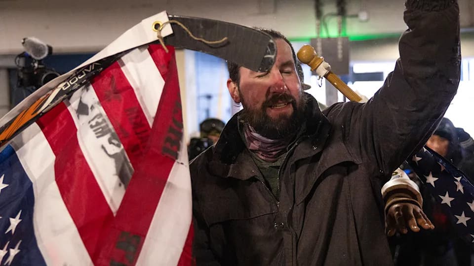 Video Shows Man Allegedly Assaulted With Flagpole by Anti‑ICE Protesters in Minneapolis Parking Garage