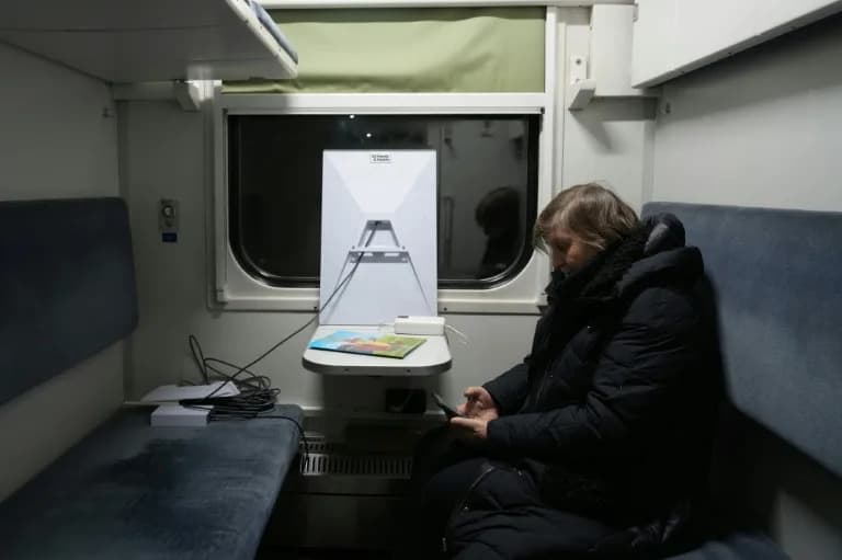 Freezing Kyiv: Residents Flee To Heated Trains, Street Tents As Power Cuts Bite