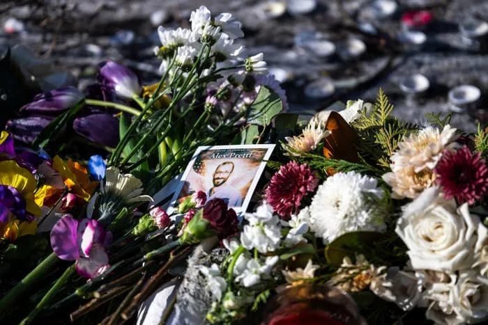 Viral Photo Of Armed MAGA Protesters Fuels Scrutiny After Alex Pretti Shooting