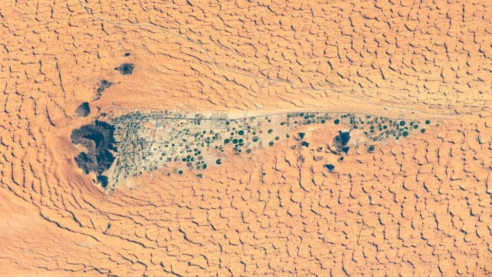 ISS Photo Reveals Oasis Town and Circular Fields in Saudi Arabia's Ancient Lakebed