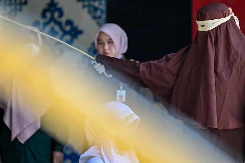 Banda Aceh: Couple Publicly Caned 140 Times Each for Extramarital Sex and Drinking