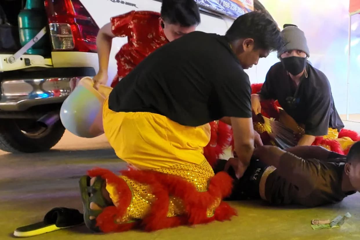 Thai Police Nab Serial Burglar While Disguised as Lion Dancer at Temple Fair