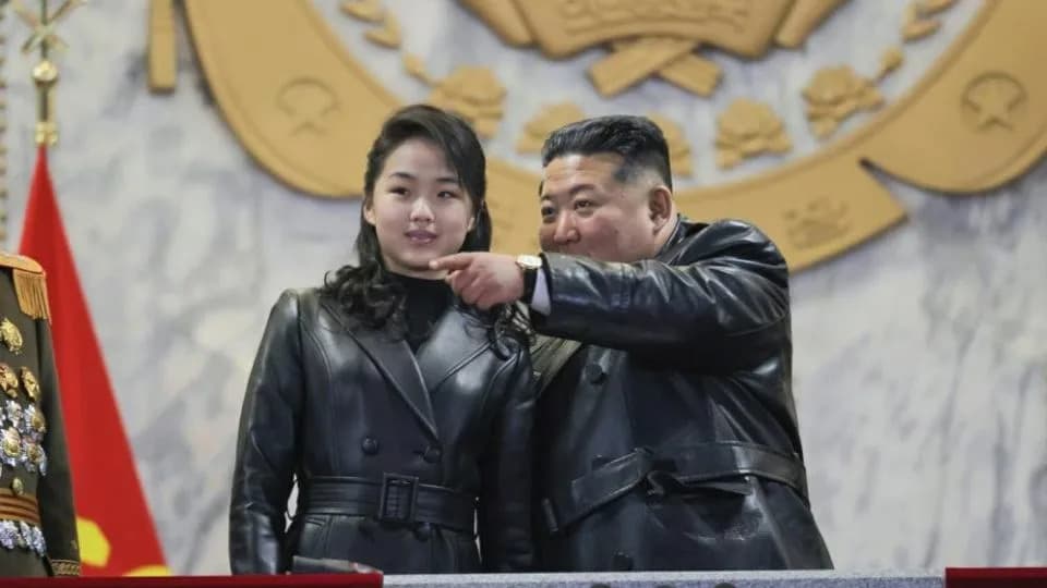 Kim Jong Un Pledges Nuclear Build-Up While Reviewing Night Parade With Daughter