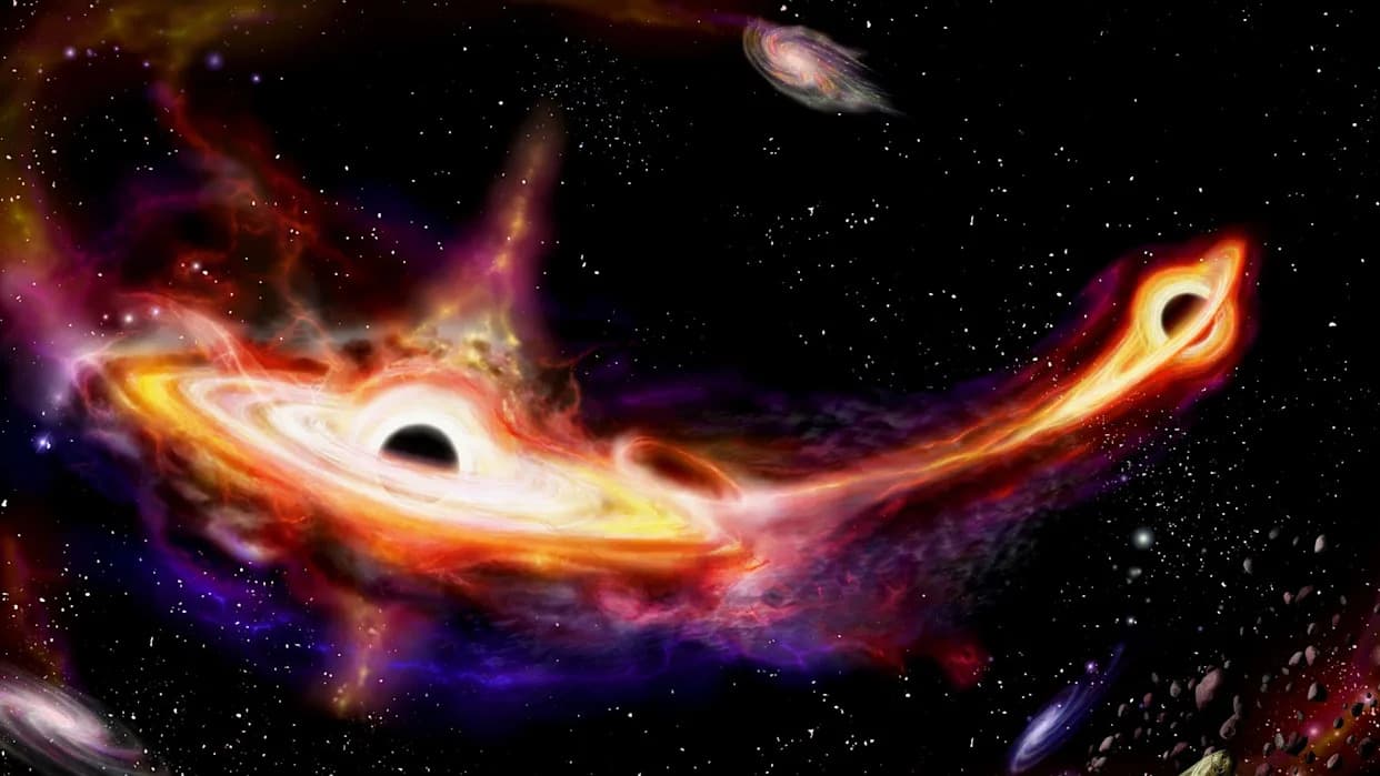 Two Giant Black Holes in Markarian 501 Are Spiraling Toward Collision