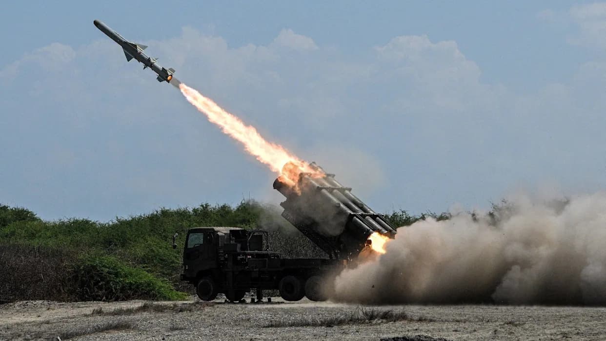 Koizumi Rejects 'New Militarism' Label, Points to China's Expanding Arsenal