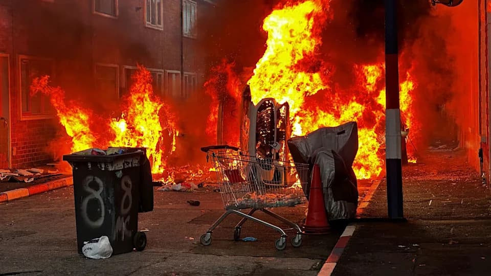 Violence Erupts Across Northern Ireland After North Belfast Knife Attack — Homes Torched, Public Transport Suspended