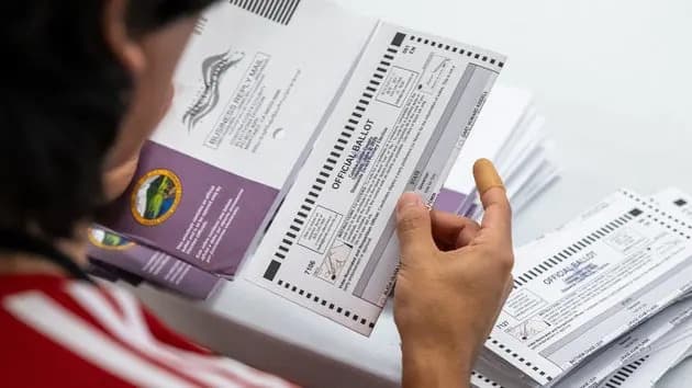 States Sue Over Trump Order That Could Curtail Mail-In Voting
