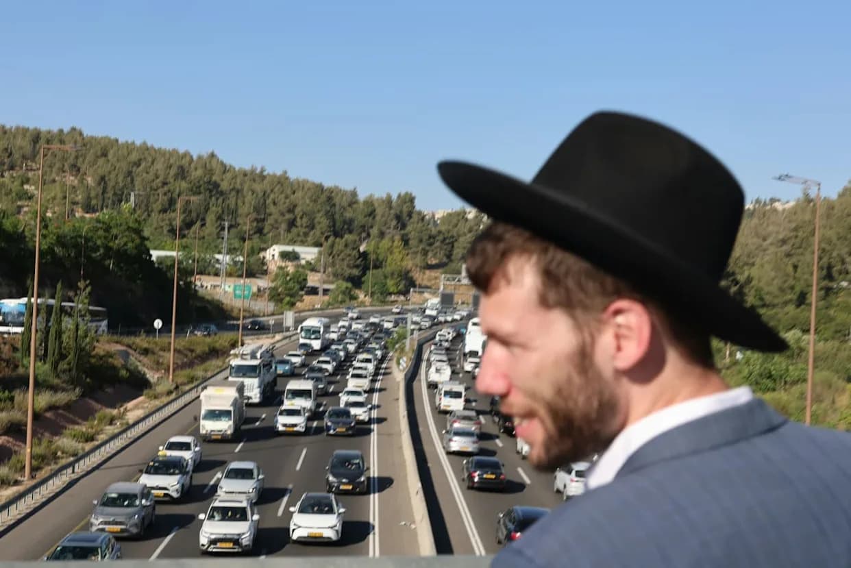 Jerusalem Police Arrest Two After Viral Video Shows Man Pointing Gun at Haredi Protesters on Highway 1