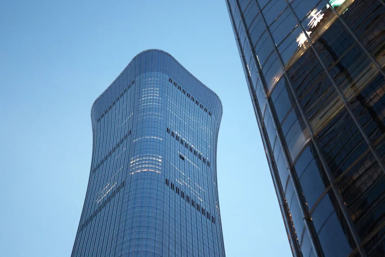 Small Plane Strikes Beijing's Citic Tower, Then Crashes Outside Entrance
