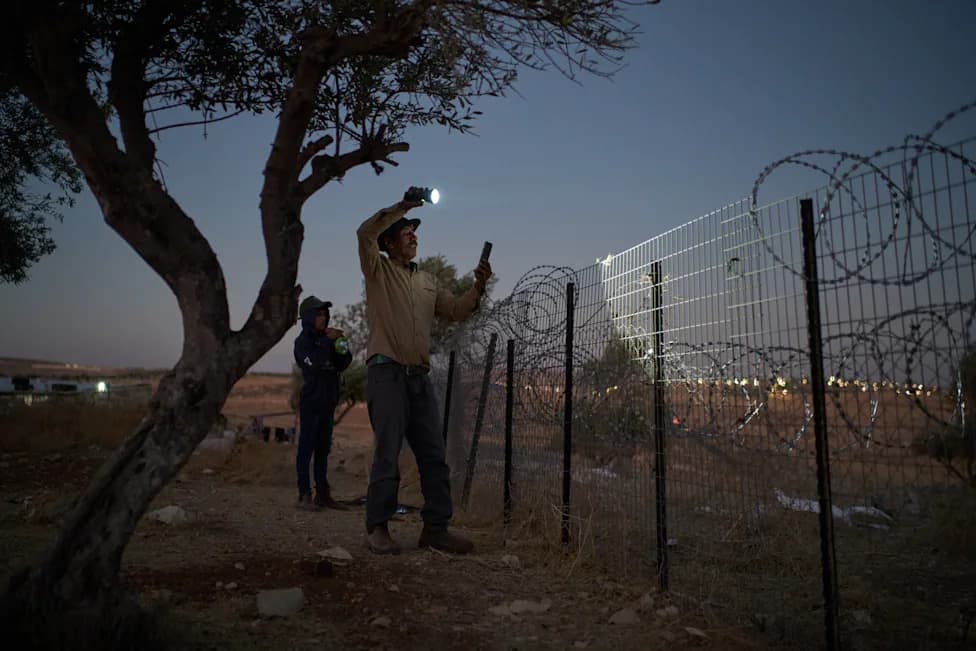Flashlight Against the Shadows: Photographer Captures West Bank Family's Nightly Vigil