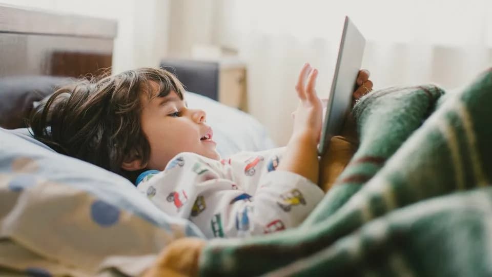 Large Review Finds Greater Screen Time Tied to Slightly Worse Child Development — What Parents Should Know