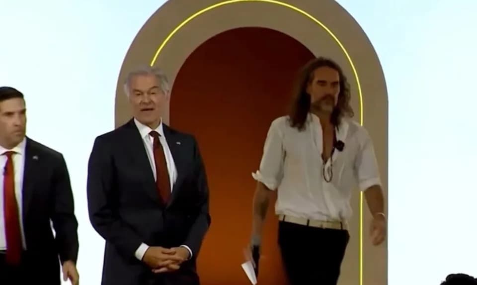 Russell Brand and Dr. Oz Trade Jokes About Hugging Trump Cabinet Member at MAHA Summit as Brand Faces Multiple Sexual-Offence Charges