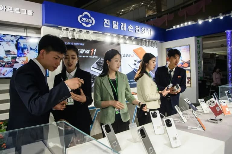 Inside Pyongyang's Trade Fair: North Korea Unveils Homegrown Jindallae Smartphone Amid Surveillance Concerns