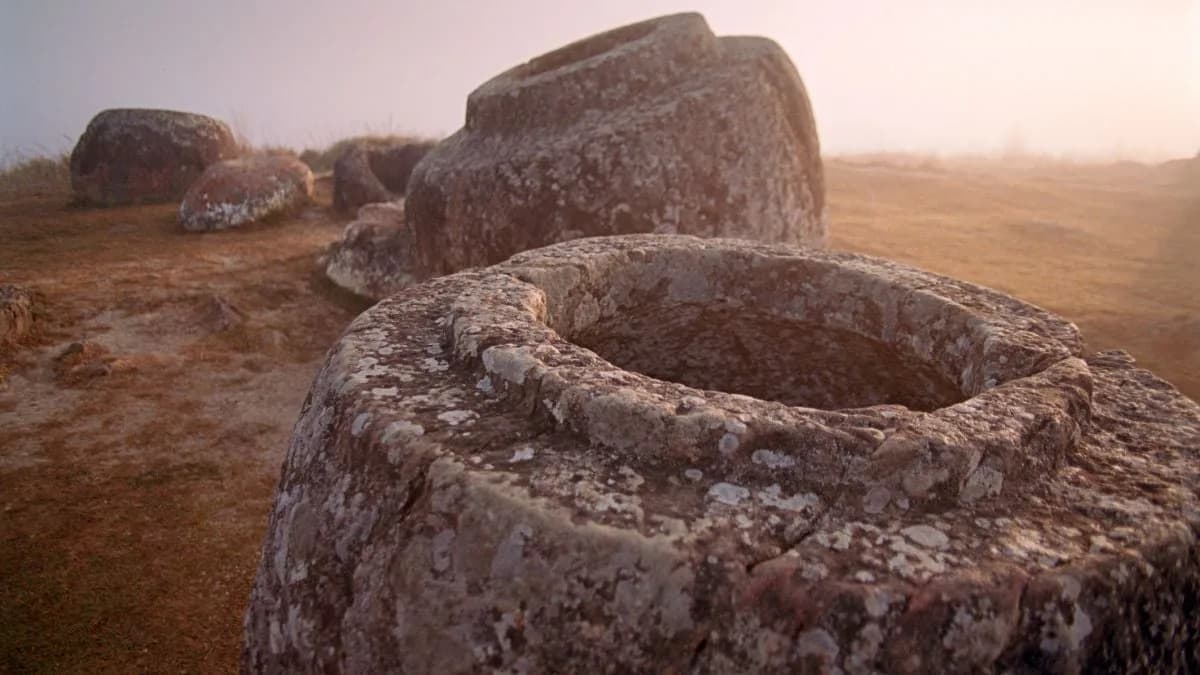 Giant Jar on Laos’ Plain of Jars Held Bones of ~37 People, Revealing Multi‑Stage Funerary Practices