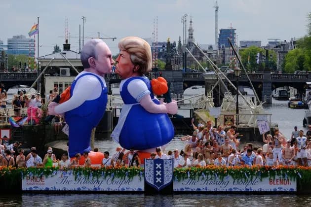 Trump–Putin Inflatable 'Kiss' Steals Spotlight at Amsterdam WorldPride Canal Parade