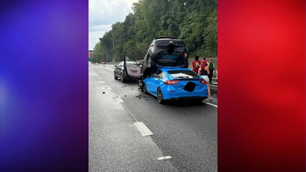 Bizarre I-285 Crash: Honda Ends Up Nearly Vertical Against SUV — No Injuries Reported