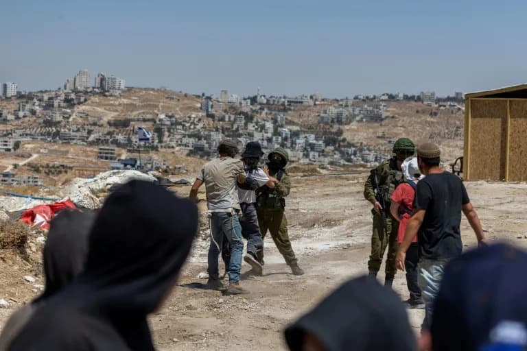 West Bank Settlers Assault AFP Journalists in Jannatah; Five Treated for Injuries