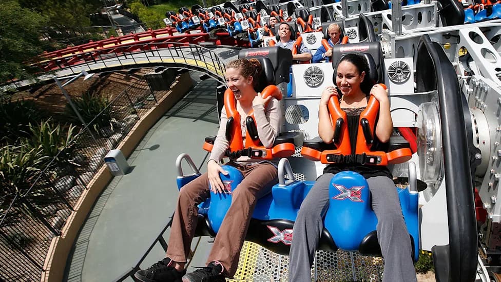 Six Flags Closes X2 Coaster After Two Riders Suffer Severe Brain Hemorrhages; Families Demand Answers