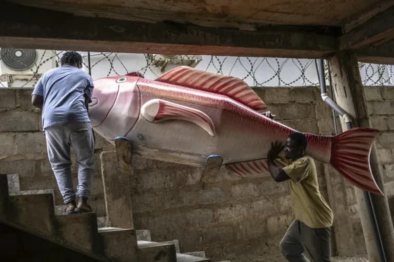 Ghana's Figurative Coffins: How Giant Guitars, Pens and Fish Celebrate a Life
