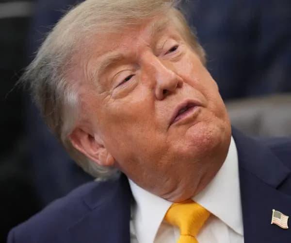 Judge Presses DOJ Over Trump’s Calls To Reindict Ex-Olympian in Reflecting Pool Case