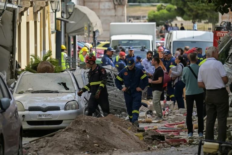 Six Missing After Explosion Levels Building Below the Acropolis; Rescuers Search Overnight