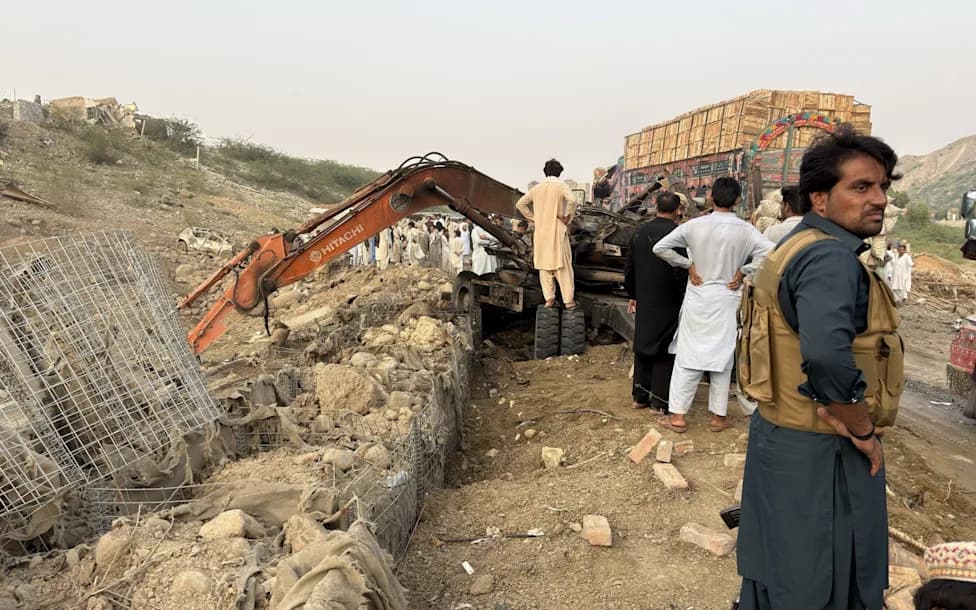 Suicide Bomber Rams Explosive-Laden Tractor Into Pakistan Police Checkpoint, Killing 12
