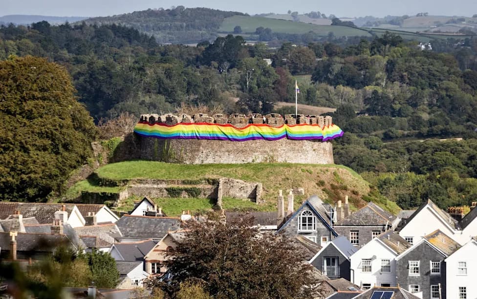 Totnes Castle Wrapped In Giant Pride Flag Prompts Local Debate Over 'Capture the Castle' Display