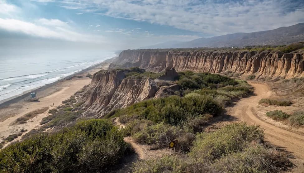 San Clemente’s North Beach Is Being Carved Away: Rising Seas Split Shoreline, Threaten Rail Corridor